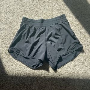 Never been worn! Black Lululemon hotty hot shorts size 6, high rise, 4 inch